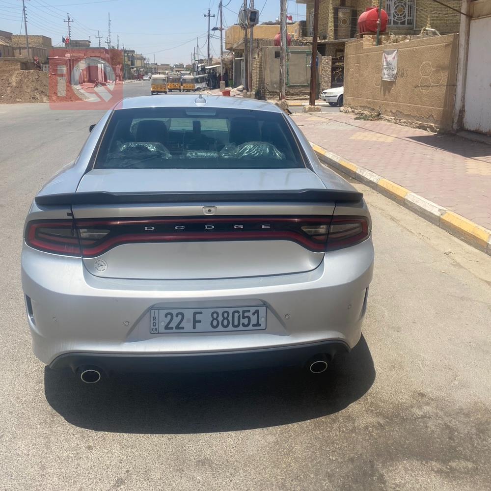 دۆج چارجەر